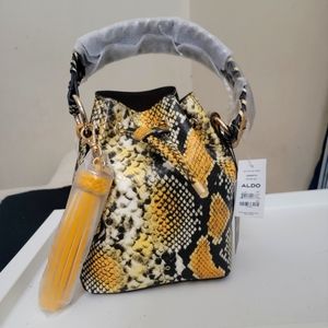 Dororyth snakeskin bucket crossbody